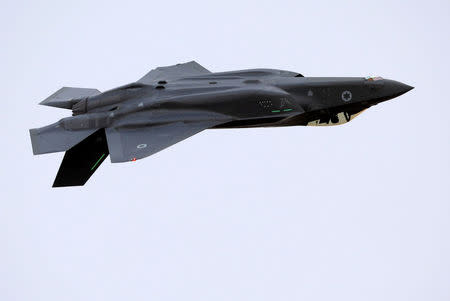 FILE PHOTO: An Israeli Air Force F-35 fighter jet flies during an aerial demonstration at a graduation ceremony for Israeli Air Force pilots at the Hatzerim Airbase in southern Israel, December 27, 2017. REUTERS/Amir Cohen/File Photo