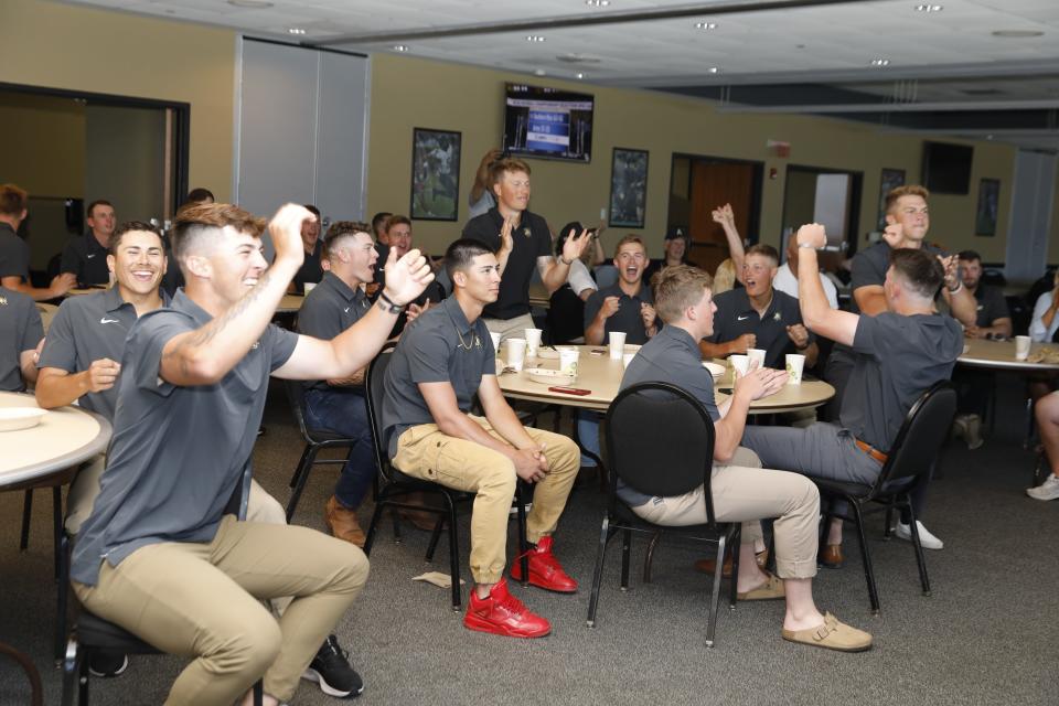 Army baseball players celebrate the moment when the Black Knights were announced on ESPN to face Southern Mississippi in the opening round of the 2022 NCAA Division I baseball tournament. ARMY ATHLETICS