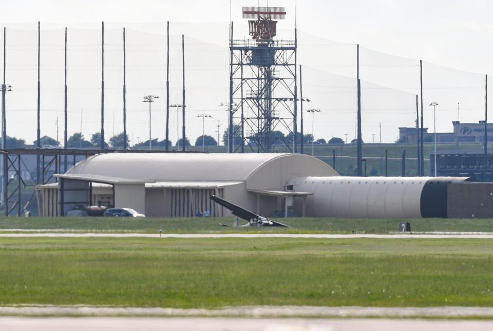 A single-engine aircraft sits at an angle after crashing on Friday, June 10, 2022, at the Sioux Falls airport.