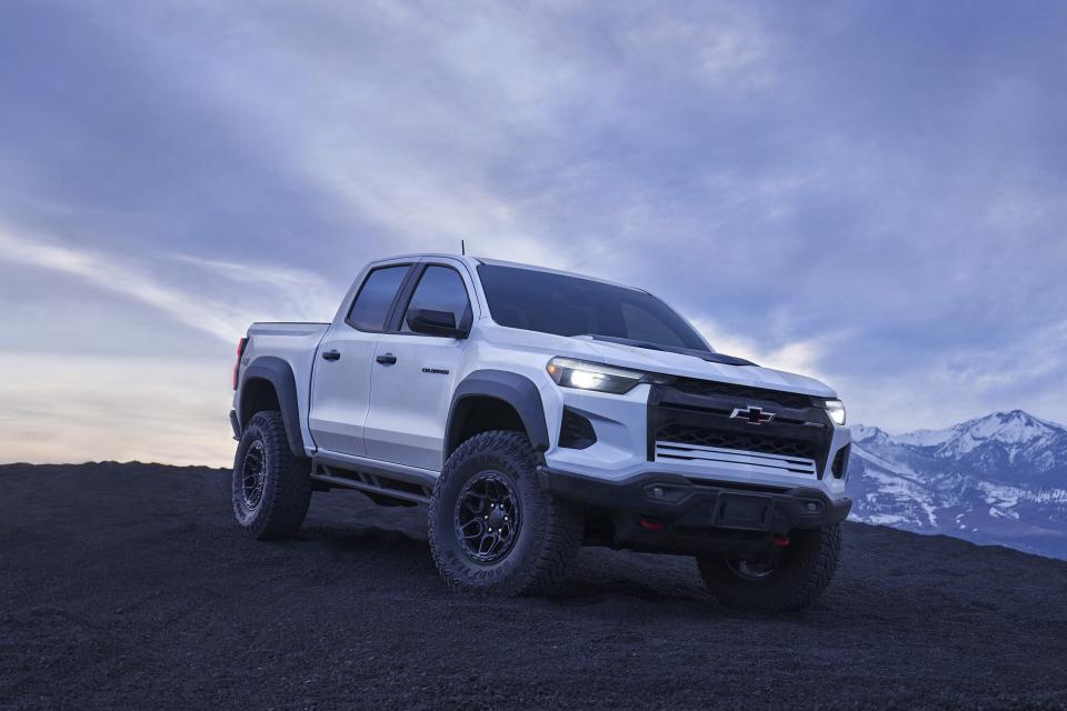 This photo provided by Chevrolet shows the 2024 Chevrolet Colorado ZR2 Bison Edition. Big all-terrain tires and a specialized suspension make it the most capable off-road version of the Colorado midsize pickup. (General Motors via AP)