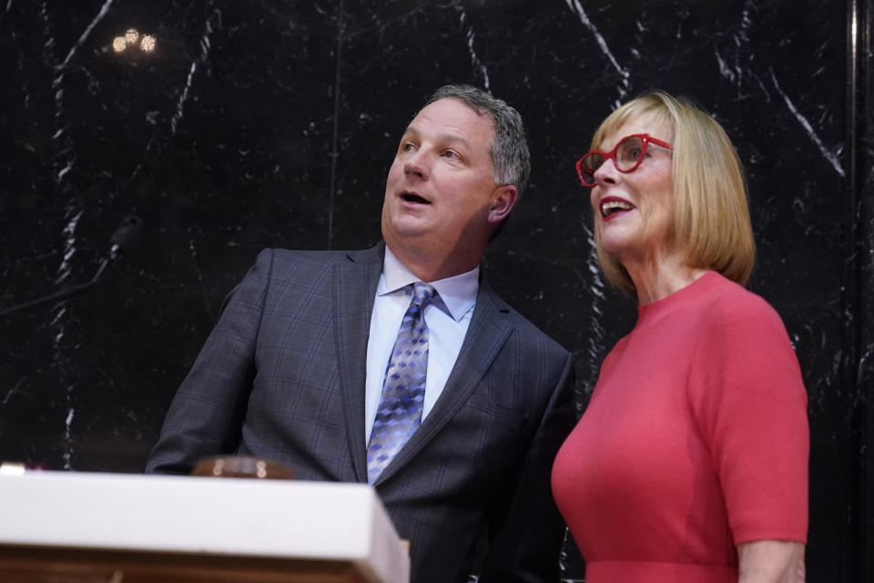 House Speaker Todd Huston, R-Fishers, talks with Lt. Gov. Suzanne Crouch before Gov. Eric Holcomb delivers his State of the State address to a joint session of the legislature at the Statehouse, Tuesday, Jan. 10, 2023, in Indianapolis. (AP Photo/Darron Cummings)