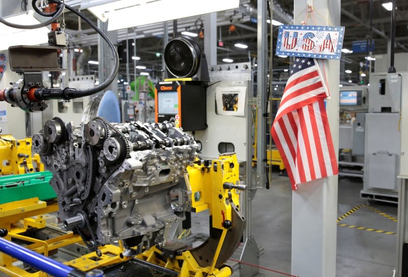 A partially assembled V6 engine, used in a variety of General Motors cars, trucks and crossovers, moves down the assembly line at the GM Romulus Powertrain plant in Romulus,