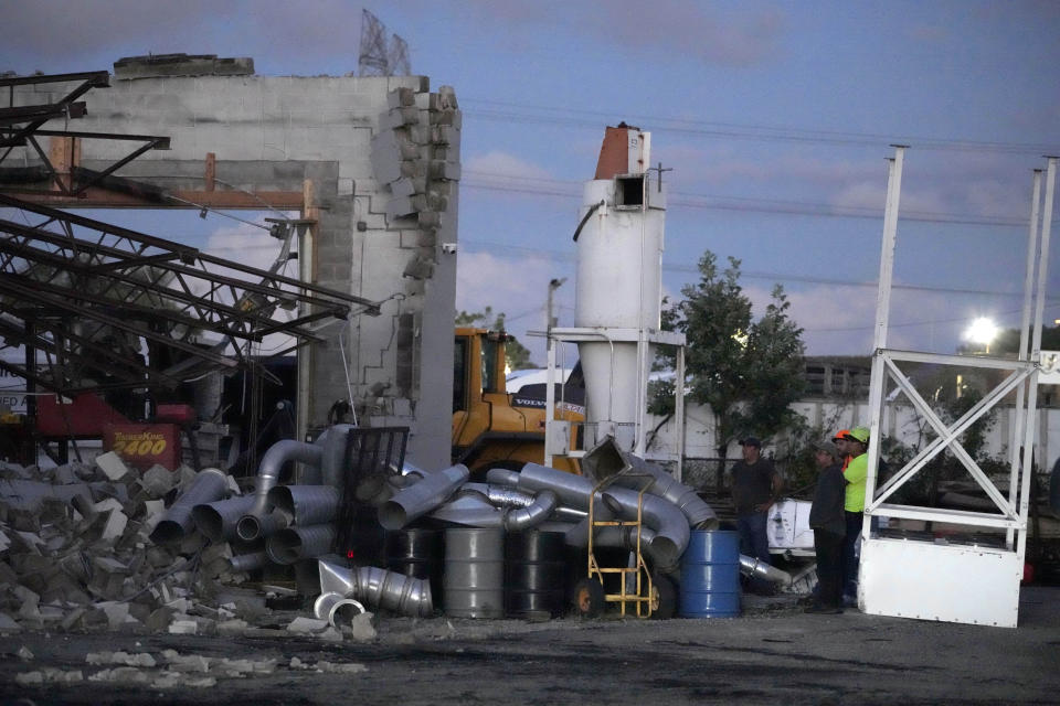 Damage is seen to the Sinnott Tree Service building in McCook, Ill., Wednesday, July 12, 2023. A tornado touched down Wednesday evening near Chicago’s O’Hare International Airport, prompting passengers to take shelter and disrupting hundreds of flights. There were no immediate reports of injuries. (AP Photo/Nam Y. Huh)