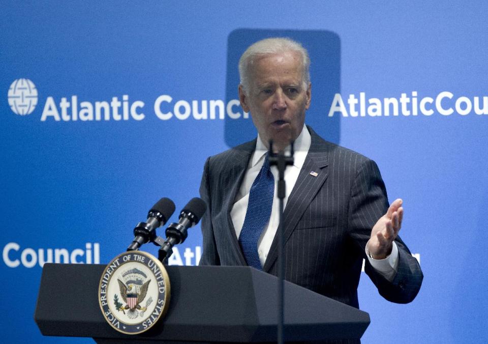 Vice President Joe Biden is seen behind a teleprompter as speaks at the Atlantic Council's conference, in a special tribute to NATO and the European Union, Wednesday, April 30, 2014, in Washington. Biden drew parallels between Russia's interference in Ukraine and the world wars of the last century. Biden said Ukraine's struggles start with Russia's acute violation of rules that the 20th century taught us must be upheld. He says Russia has violated the fundamental principle that Europe's borders cannot be changed by military force. (AP Photo/Jose Luis Magana)