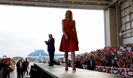 U.S. President Donald Trump and first lady Melania Trump arrive at a "Make America Great Again" rally at Orlando-Melbourne International Airport in Melbourne, Florida, U.S. February 18, 2017. REUTERS/Kevin Lamarque