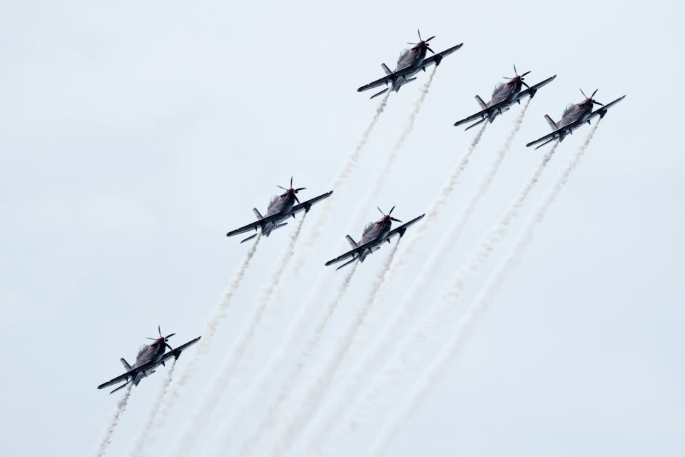 The Roulettes, the Royal Australian Air Force's aerobatic display team, perform for Australia Day celebrations in Sydney, Friday, Jan. 26, 2024. (AP Photo/Rick Rycroft)