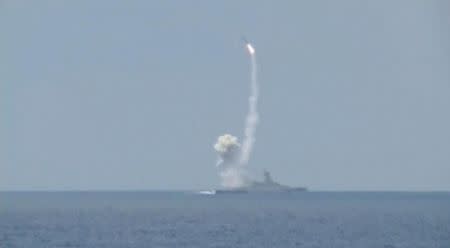 A still image, taken from video footage and released by Russia's Defence Ministry on August 19, 2016, shows a rocket being launched from a Russian corvette in the Mediterranean Sea at Jabhat Fateh al-Sham militant targets in Syria, according to the ministry. Ministry of Defence of the Russian Federation/Handout via Reuters