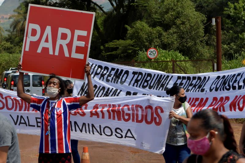 FILE PHOTO: People affected by the disaster of the tailings dam owned by Brazilian mining company Vale SA, protest in front of the company, two years after it collapsed in Brumadinho