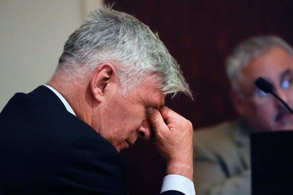 Alec Baldwin wipes his eyes during a pretrial hearing Monday, ahead of the start if his involuntary manslaughter trial, beginning on July 9 (AP)