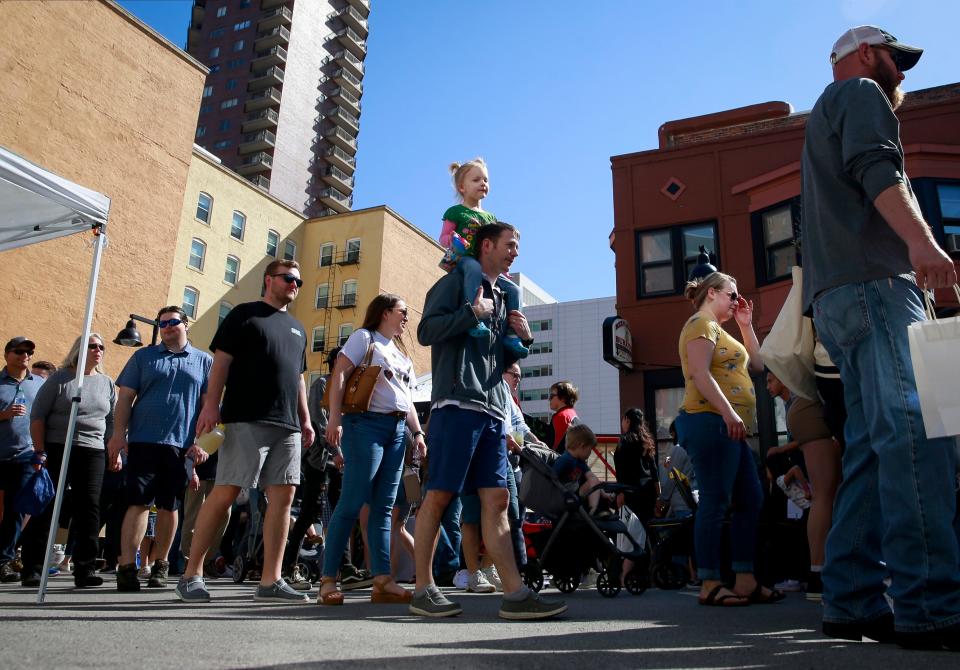 Thousands of market goers converged on downtown Des Moines during the opening day of the 2022 downtown Farmers' Market on Saturday, May 7.