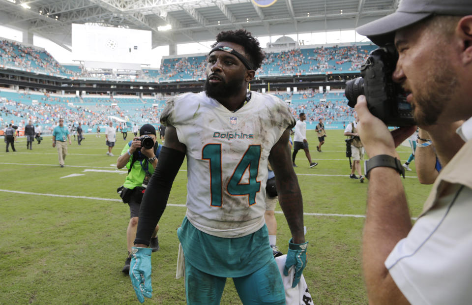 Jarvis Landry’s hands were good enough to earn the franchise tag from the Miami Dolphins, a designation that could pay him at least $16.2 million next season. (AP)