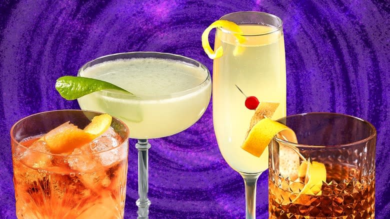 four cocktails on purple background