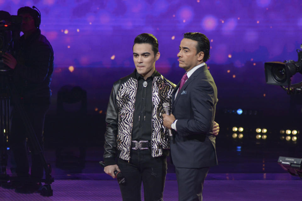 MEXICO CITY, MEXICO - DECEMBER 15: Dennis ecives support to Adal Ramones during the sixth concert of La Academia at Azteca Tlalpan on December 15, 2019 in Mexico City, Mexico. (Photo by Medios y Media/Getty Images)