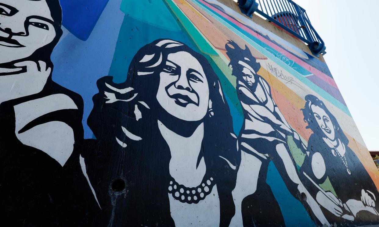 <span>A mural by Miriam Klein Stahl, Eric Norberg and the Arts and Humanities Academy at Berkeley high school, shows Kamala Harris on a wall at the elementary school in Berkeley, California, where she went to school.</span><span>Photograph: John G Mabanglo/EPA</span>