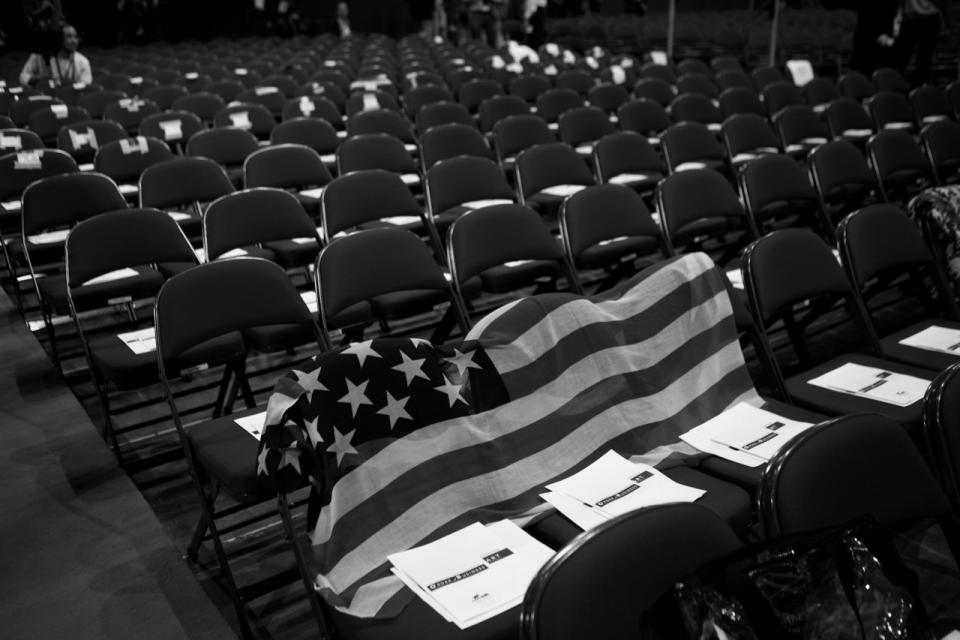 <p>A flag is used to reserve seats. (Photo: Khue Bui for Yahoo News)</p>