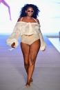 <p>A model walks the runway in a white summer blouse and bikini bottom for the <em>Sports Illustrated</em> swimsuit show during the Paraiso Fashion Fair in Miami at the W South Beach hotel on July 15. (Photo: Alexander Tamargo/Getty Images for Sports Illustrated) </p>