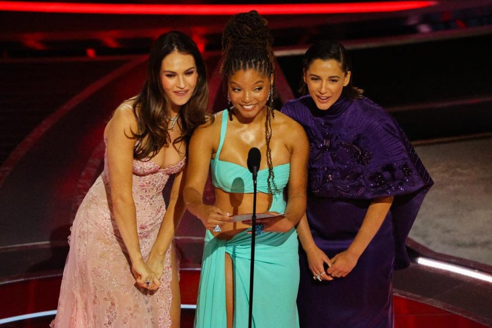 Bailey, Lily James, and Naomi Scott present the Oscar for the Best Animated Feature Film at the 94th Academy Awards in Hollywood (REUTERS)