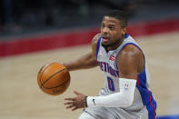 Detroit Pistons guard Dennis Smith Jr. drives to the basket during the second half of an NBA basketball game against the Sacramento Kings, Friday, Feb. 26, 2021, in Detroit. (AP Photo/Carlos Osorio)