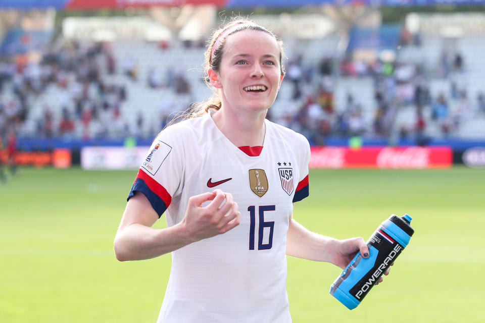 REIMS, FRANCE - JUNE 24: #16 Rose Lavelle of USA celebrate the victory with fans after the 2019 FIFA Women's World Cup France Round Of 16 match between Spain and USA at Stade Auguste Delaune on June 24, 2019 in Reims, France. (Photo by Zhizhao Wu/Getty Images)