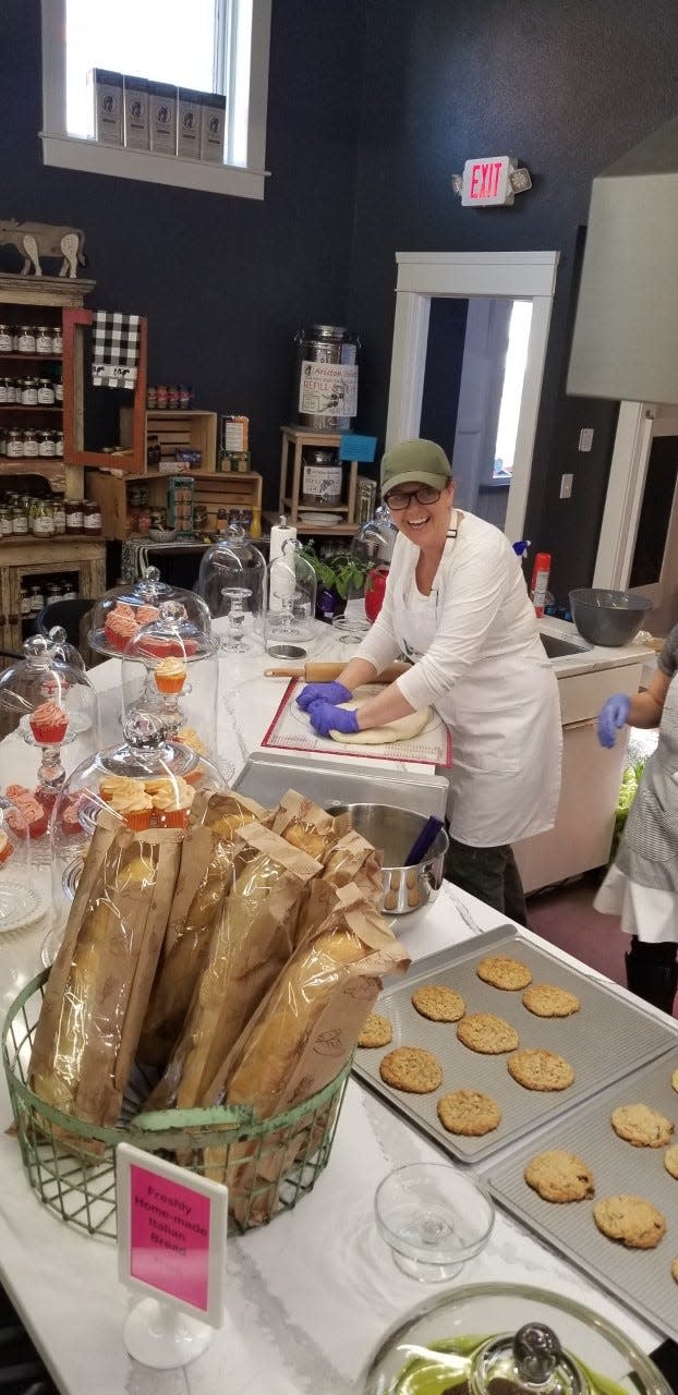 The Capers Emporium kitchen class area is also the bakery when classes aren't in session. Here, baker Martha Wilkinson prepares breads, cookies and more.