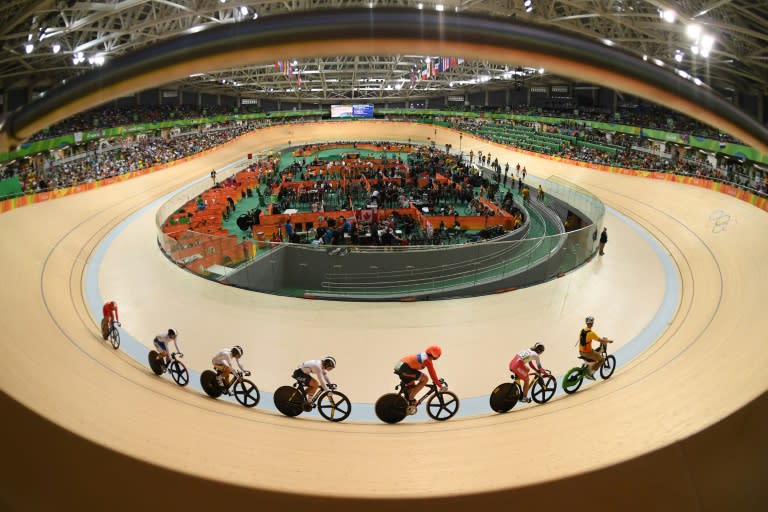 (From 2R) Russia's Anastasiia Voinova, Netherlands' Elis Ligtlee, Germany's Kristina Vogel, Colombia's Martha Bayona Pineda, South Korea's Lee Hyejin and China's Zhong Tianshi compete in the women's keirin second round event on August 13, 2016