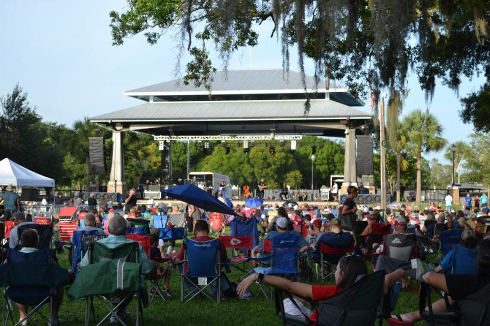 Festival goers enjoy Palmetto’s 10th annual Fourth Fest at Sutton Park in this 2021 Bradenton Herald file photo. This year the festival is moving to Riverside Park by the Green Bridge.