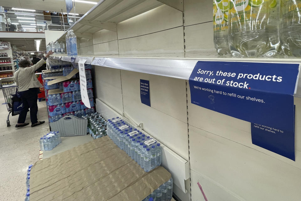 A view of empty shelves at a supermarket in London, Monday, Sept. 20, 2021. Retailers, manufacturers and food suppliers have reported disruptions due to a shortage of truck drivers linked to the pandemic and Britain's departure from the European Union, which has made it harder for many Europeans to work in the U.K. (AP Photo/Frank Augstein)