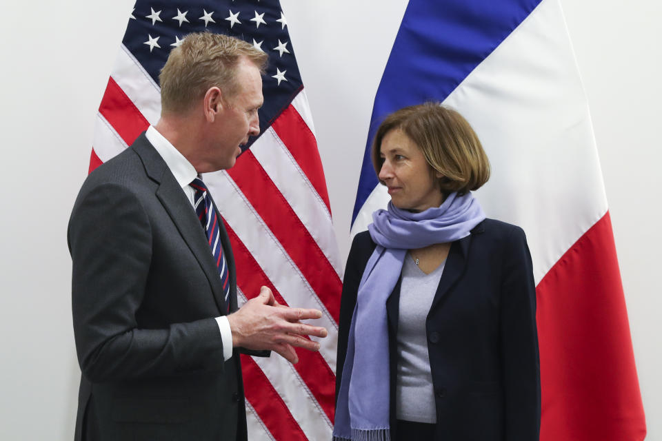 Acting US Defence Secretary Patrick Shanahan, left, talks to France's Defence Minister Florence Parly during a bilateral meeting at the second day of a NATO defense ministers meeting at NATO headquarters in Brussels, Thursday, Feb. 14, 2019. NATO defense ministers are discussing the future of the alliance's operation in Afghanistan and how best to use its military presence to support political talks aimed at ending the conflict. (AP Photo/Francisco Seco)