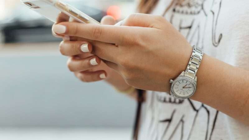 A person holding a smartphone