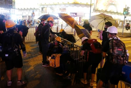 Anti-extradition bill protesters set up a roadblock at Tsim Sha Tsui neighborhood in Hong Kong