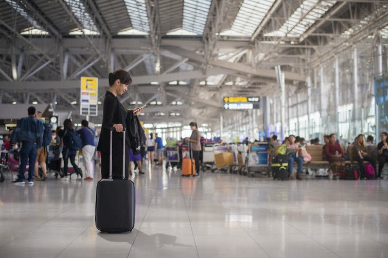 <span class="caption">People will want to avoid spending time in busy airports post-coronavirus.</span> <span class="attribution"><a class="link " href="https://www.shutterstock.com/image-photo/elegant-asian-businesswoman-checking-email-on-617208134" rel="nofollow noopener" target="_blank" data-ylk="slk:Shutterstock;elm:context_link;itc:0;sec:content-canvas">Shutterstock</a></span>