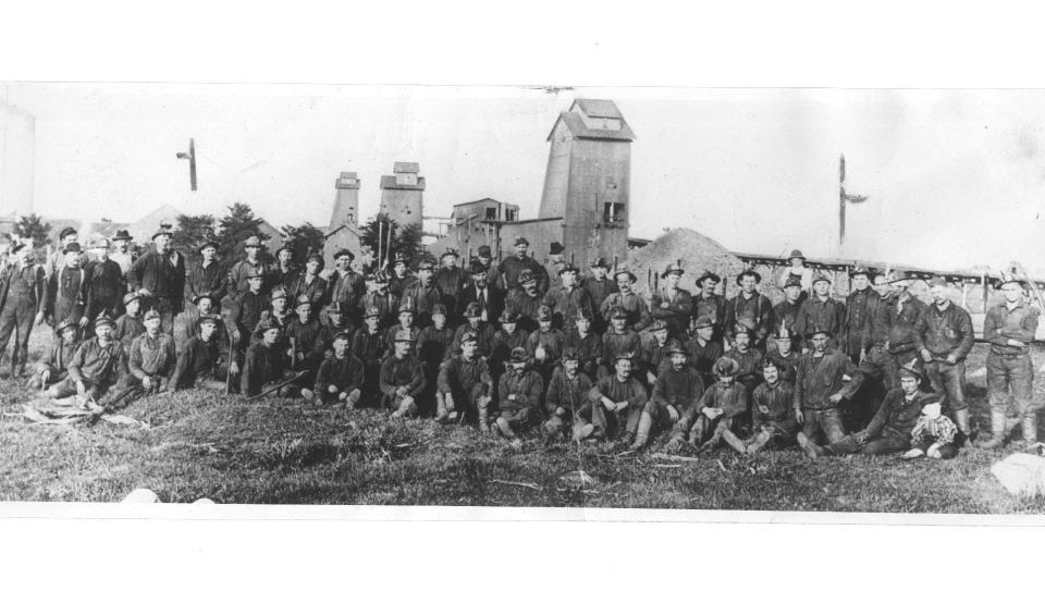 Lead miners pose for a picture in Hazel Green in the 19th century. During Wisconsin's lead boom, some miners built their homes by burrowing into the ground, badger-style