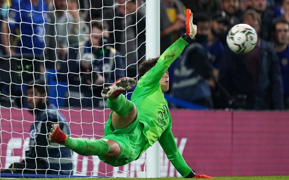 Chelsea goalkeeper Kepa Arrizabalaga saves a penalty during the shoot-out during the Carabao Cup third round match at Stamford Bridge -  Mike Egerton/PA 