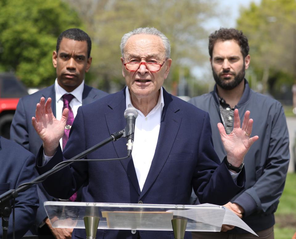 Senator Chuck Schumer, standing with Rochester Mayor Malik Evans and Councilmember Mitch Gruber, talks about  the importance of trees and tree canopy during a press conference and tree planting on Holland Street in the Upper Falls Neighborhood Monday, May 8, 2023 in Rochester. 