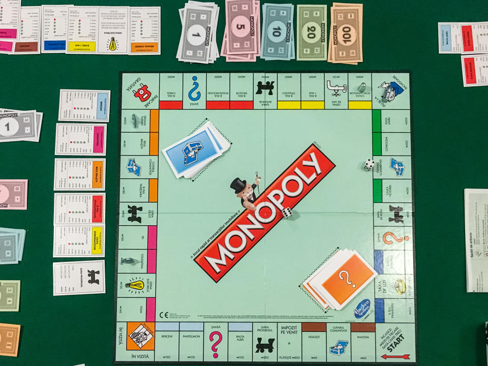 Bucharest, Romania - January 01, 2016: Monopoly is a board game that originated in the United States in 1903 and the current version was first published by Parker Brothers in 1935.