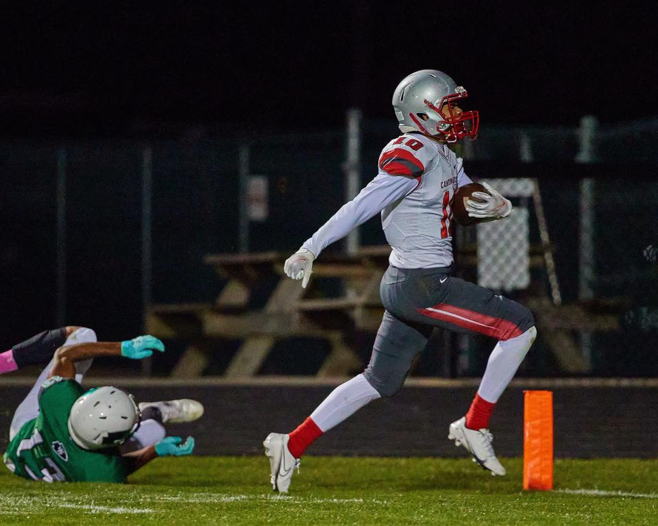 Canton South's Caleb Lott (10) scores during their game at West Branch on Friday, Oct. 2, 2020