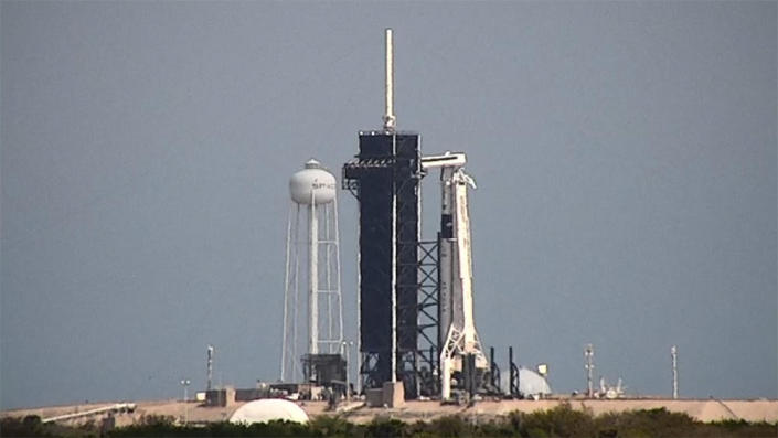 A SpaceX Falcon 9 rocket carrying the next station-bound Crew Dragon ferry ship was erected at pad 39A at the Kennedy Space Center overnight Wednesday, setting the stage for launch early Monday.  On board will be two NASA astronauts, a Russian cosmonaut and a United Arab Emirates flier.  / Credit: CBS News