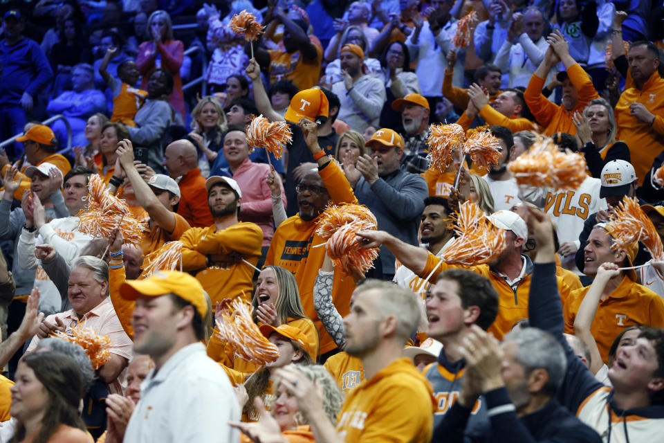 Tennessee fans celebrate a play during the second half of a Sweet 16 college basketball game against Creighton in the NCAA Tournament, Friday, March 29, 2024, in Detroit. (AP Photo/Duane Burleson)