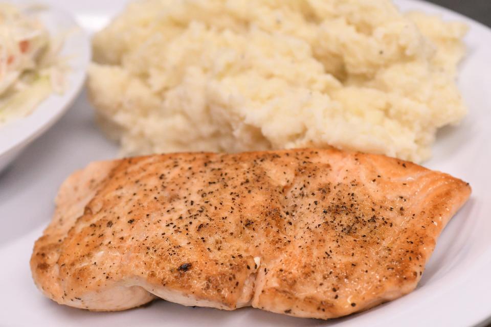 Grilled salmon is a healthy meat option for summer cooking outdoors.
