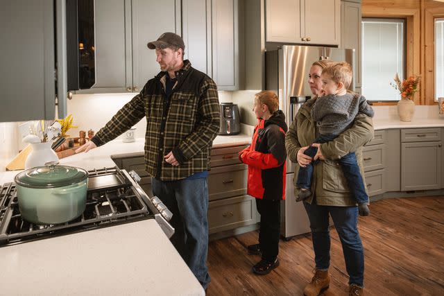 <p>The Home Depot Foundation </p> Jonathan and Samantha Turnbull and family check out the smart kitchen