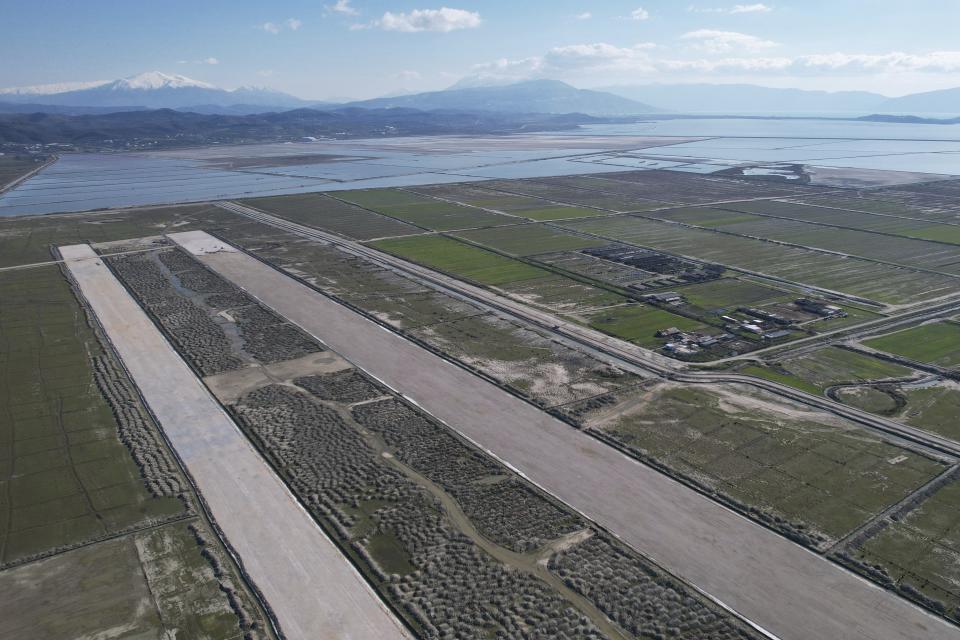 General view of the new airport area about 140 kilometers (90 miles) southwest of the Albanian capital of Tirana, Tuesday, Feb. 7, 2023. Environmentalists fear that the new airport will harm the local fauna and ecosystem of this lagoon as it is home to many migratory birds. (AP Photo/Franc Zhurda)