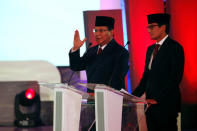 Indonesia's presidential candidate Prabowo Subianto (L) speaks as he running mate Sandiaga Uno listens during a televised debate with his opponent Joko Widodo (not pictured) and Ma'ruf Amin in Jakarta, Indonesia January 17, 2019. REUTERS/Willy Kurniawan