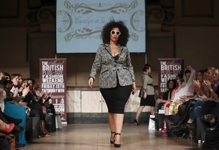 A plus-size model wears clothes from Carolyn de la Drapiere at Shoreditch Town Hall, East London today. "Thank you all for being who you are", declared one of the organisers at the first Official British Plus-Size Fashion Weekend in Shoreditch, an edgy district in the east of the capital beloved of young hipsters and music fans