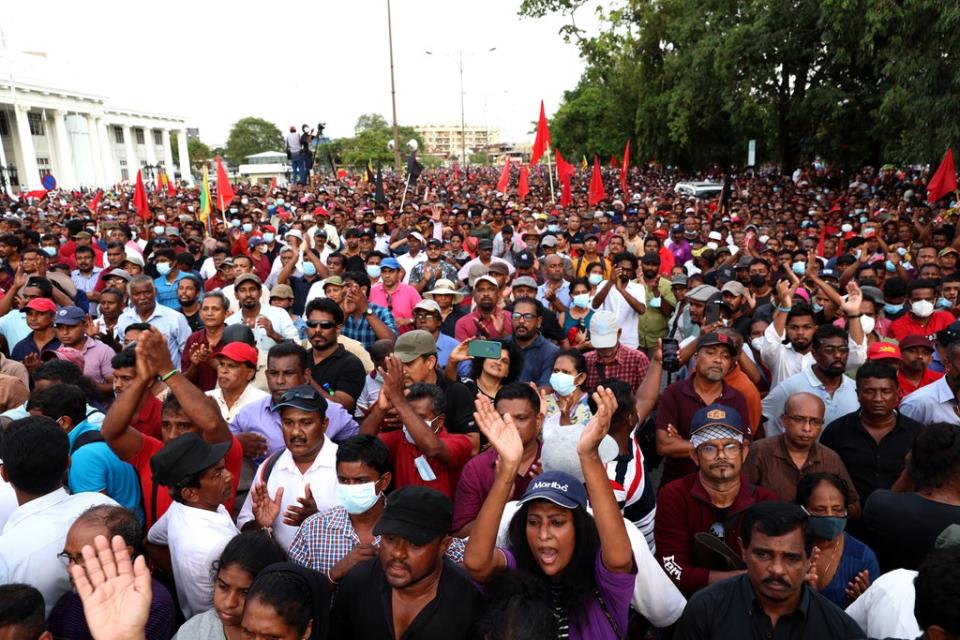 Demonstrators stage a protest street rally against Sri Lankan president Gotabaya Rajapaksa on 19 April in Colombo (Getty)