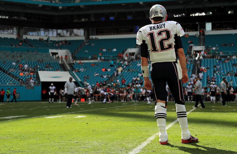 He stands alone: The winningest quarterback in NFL history, Tom Brady set another record on Sunday. (Getty Images)