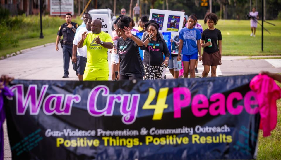 About 35 people took part in a Prayer Walk organized by War Cry 4 Peace Thursday afternoon in Ocala.