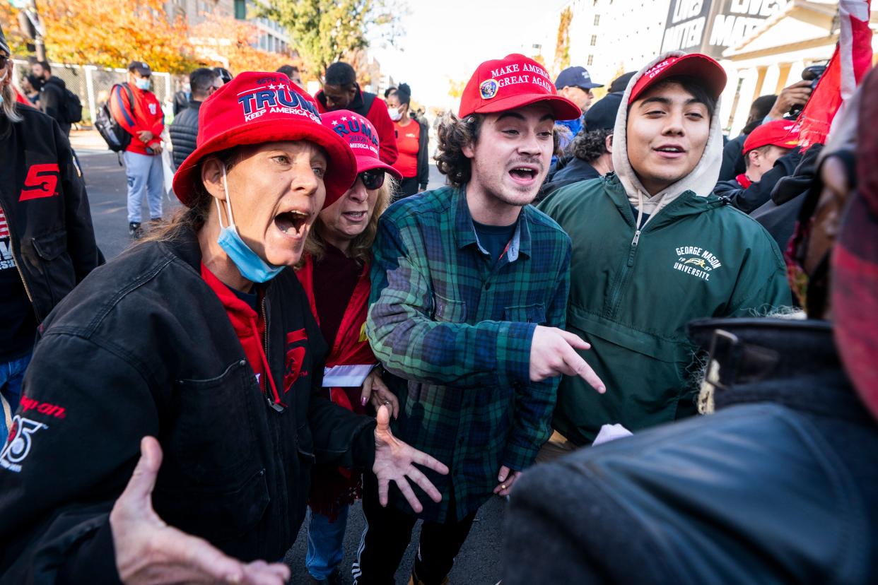 Supporters of US President Donald J. Trump clash with a supporter of President-elect Joe Biden in Black Lives Matter (BLM) plaza outside the White House ahead of an upcoming rally to support Trump's baseless claims of voter fraud in the 2020 presidential election in Washington, DC, USA, 13 November 2020. On 14 November, Pro-Trump and White Nationalist groups plan to converge on DC to protest the election. On 12 November, the Cybersecurity and Infrastructure Security Agency, a division of the Department of Homeland Security, stated 'the November 3rd election was the most secure in American history.'  EPA/JIM LO SCALZO (EPA)