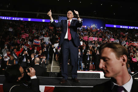 U.S. Vice President-elect Mike Pence arrives to speak during a USA Thank You Tour event with U.S. President-elect Donald Trump in Hershey, Pennsylvania, U.S., December 15, 2016. REUTERS/Lucas Jackson