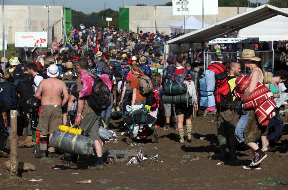 Music Fans Depart From The Glastonbury Festival