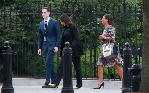 Kim Kardashian arrives at the security entrance of the White House  - Credit: Pablo Martinez Monsivais/AP